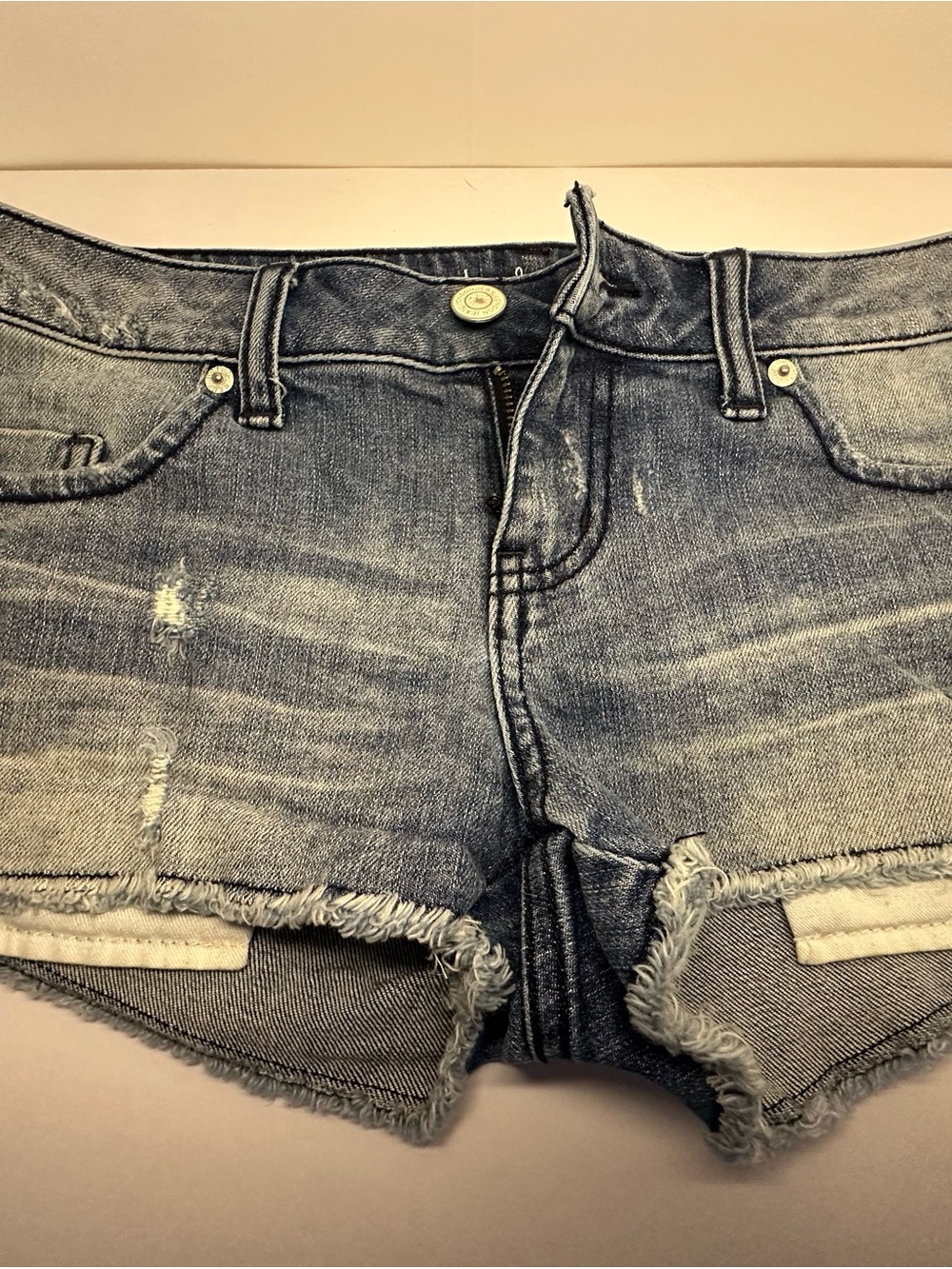 LONDONJEAN Faded Blue Distressed Denim Cheeky Cut-off Shorts